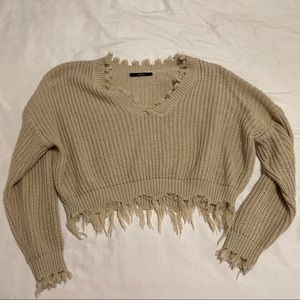 Cropped fringe sweater